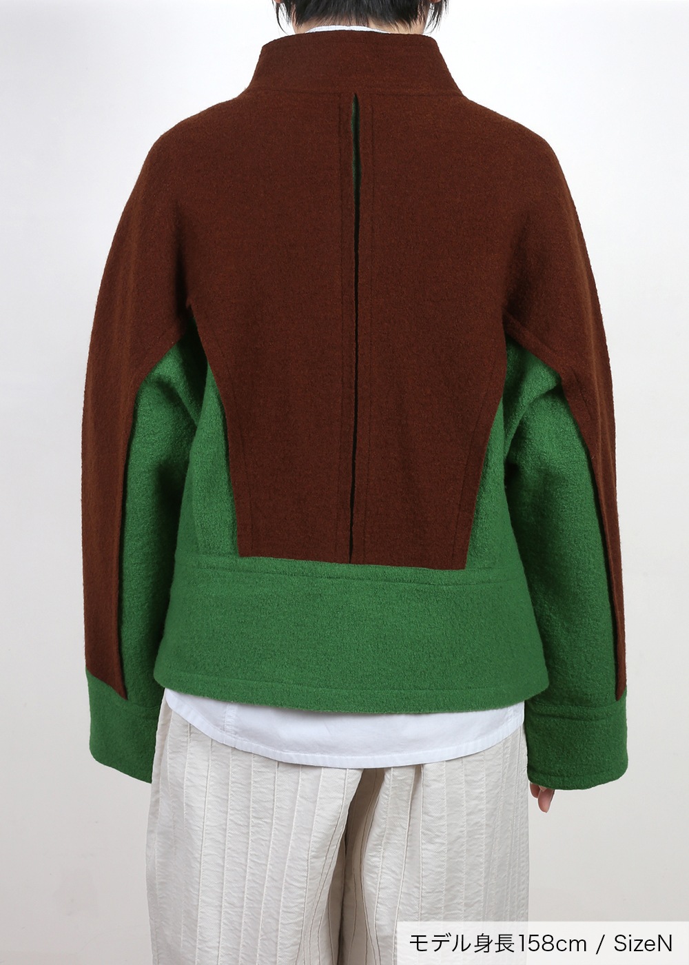 圧縮ニットハイネック裾切り替えジャケット