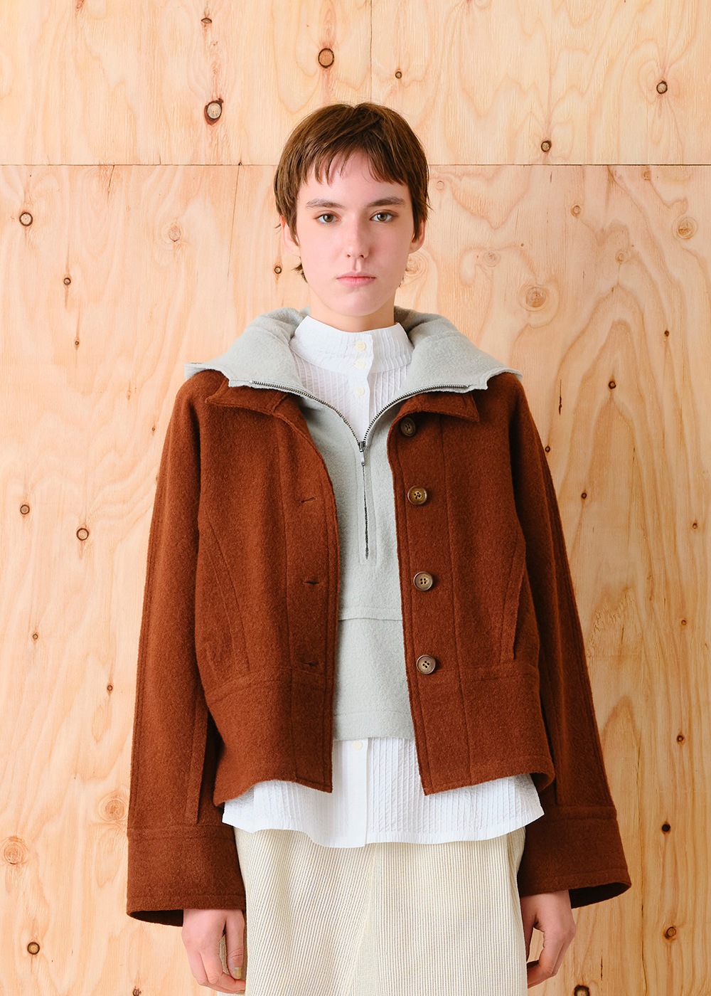 圧縮ニットハイネック裾切り替えジャケット