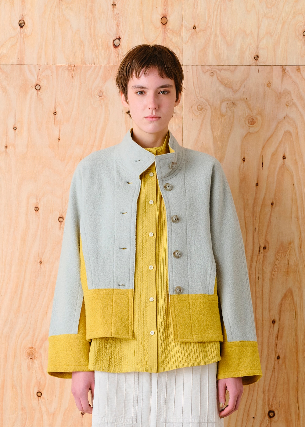 圧縮ニットハイネック裾切り替えジャケット