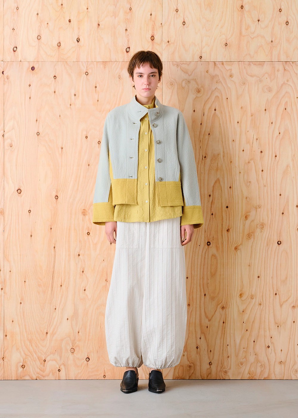 圧縮ニットハイネック裾切り替えジャケット