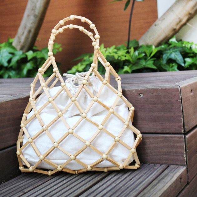 ハンドメイド✳✳パッチワーク 巾着バッグ トートバッグ 黒花柄 - メルカリ