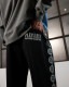 ��PLEASURES/�ץ쥸�㡼����MYTHIC HOPE TRACK PANTS �ȥ�å��ѥ�� / BLACK