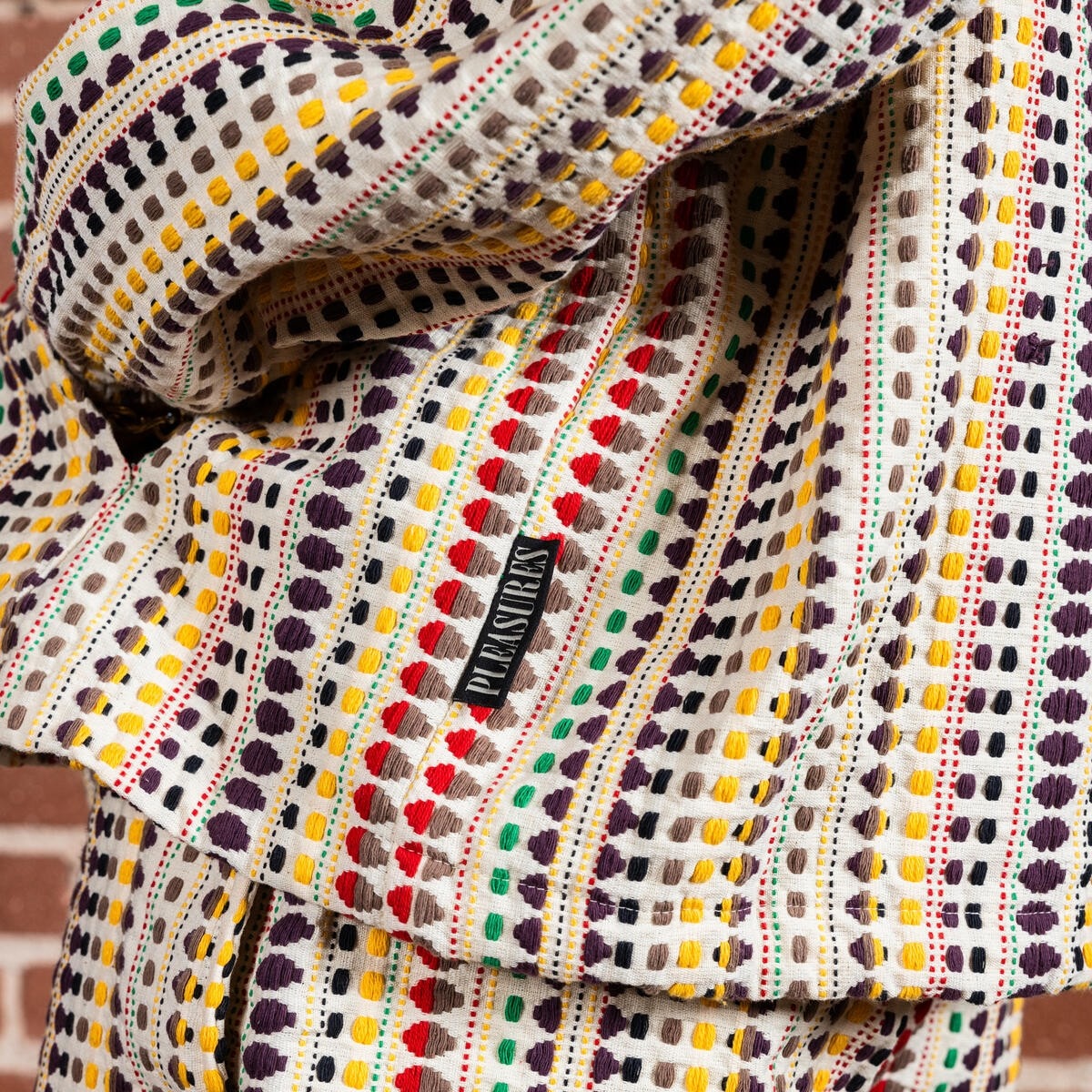 PLEASURES/ץ쥸㡼STITCH PONCHO HOODIE ѡ / ECRU