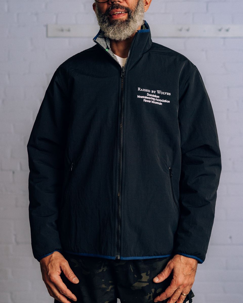 ��RAISED BY WOLVES/�쥤���ɥХ�����֥���DMA REVERSIBLE FLEECE JACKET ���㥱�å� / BLACK