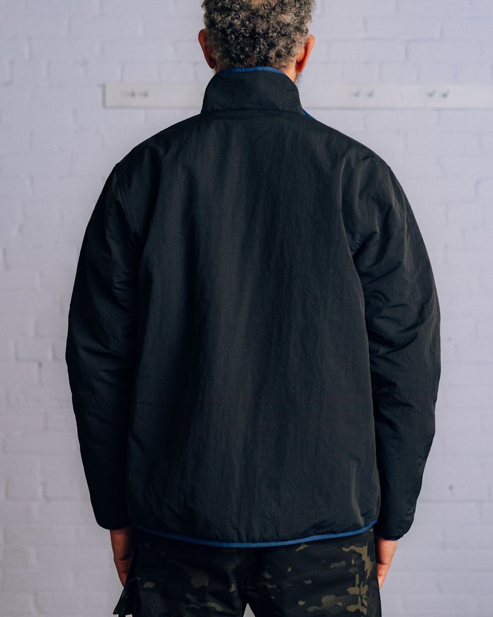 ��RAISED BY WOLVES/�쥤���ɥХ�����֥���DMA REVERSIBLE FLEECE JACKET ���㥱�å� / BLACK