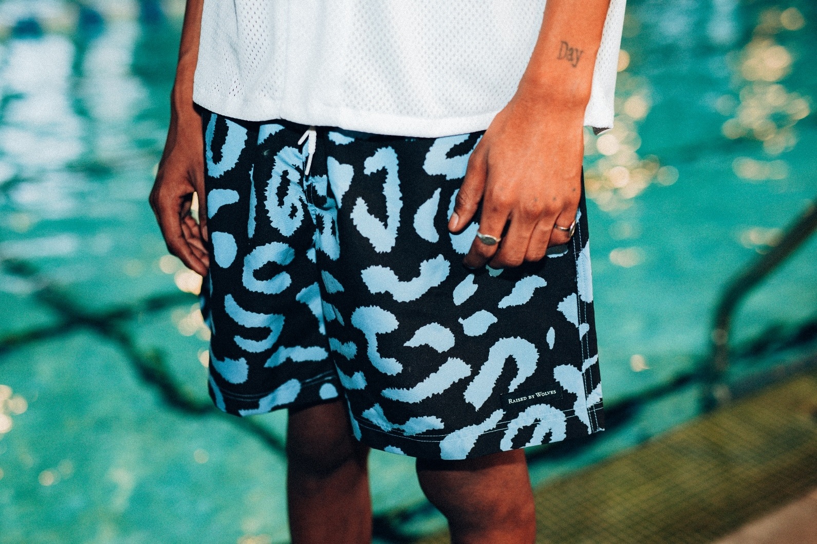 RAISED BY WOLVES/쥤ɥХ֥PEACE CAMO WATER SHORTS 硼ȥѥ / BLACK ֥å