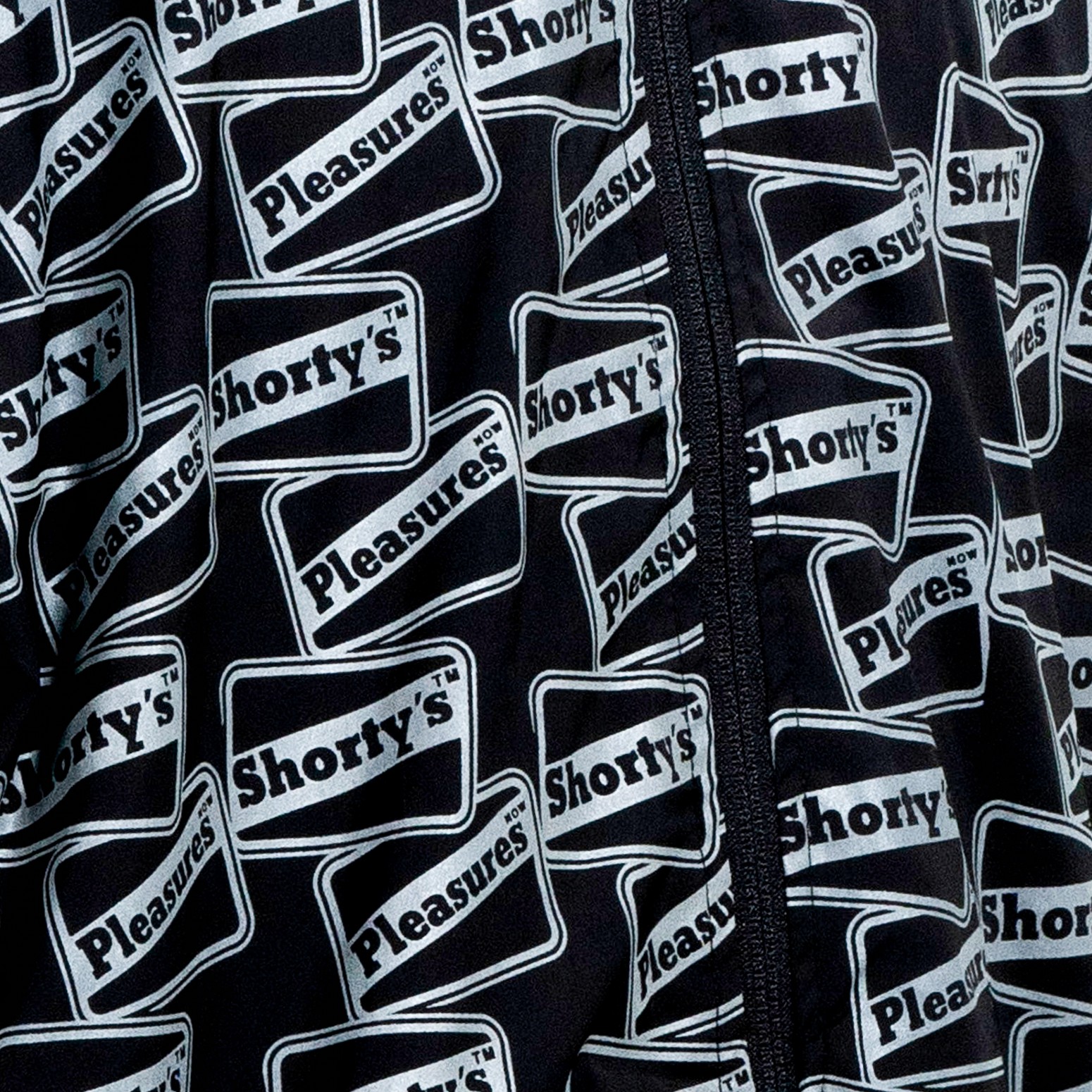 PLEASURES/ץ쥸㡼SHORTY'SREFLECTIVE TRACK JACKET 㥱å / BLACK