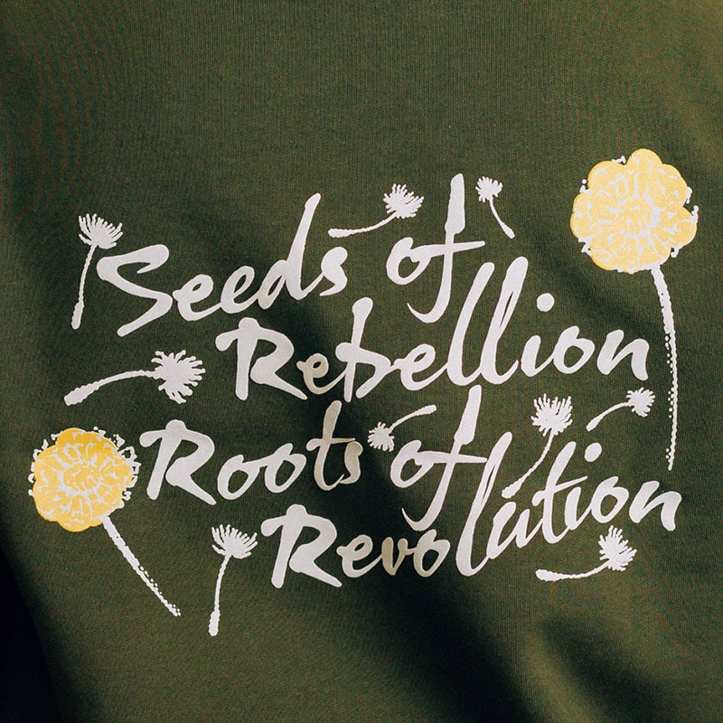 ��RAISED BY WOLVES/�쥤���ɥХ�����֥���SEEDS OF REBELLION SNAP HOODIE �ѡ����� / OLIVE