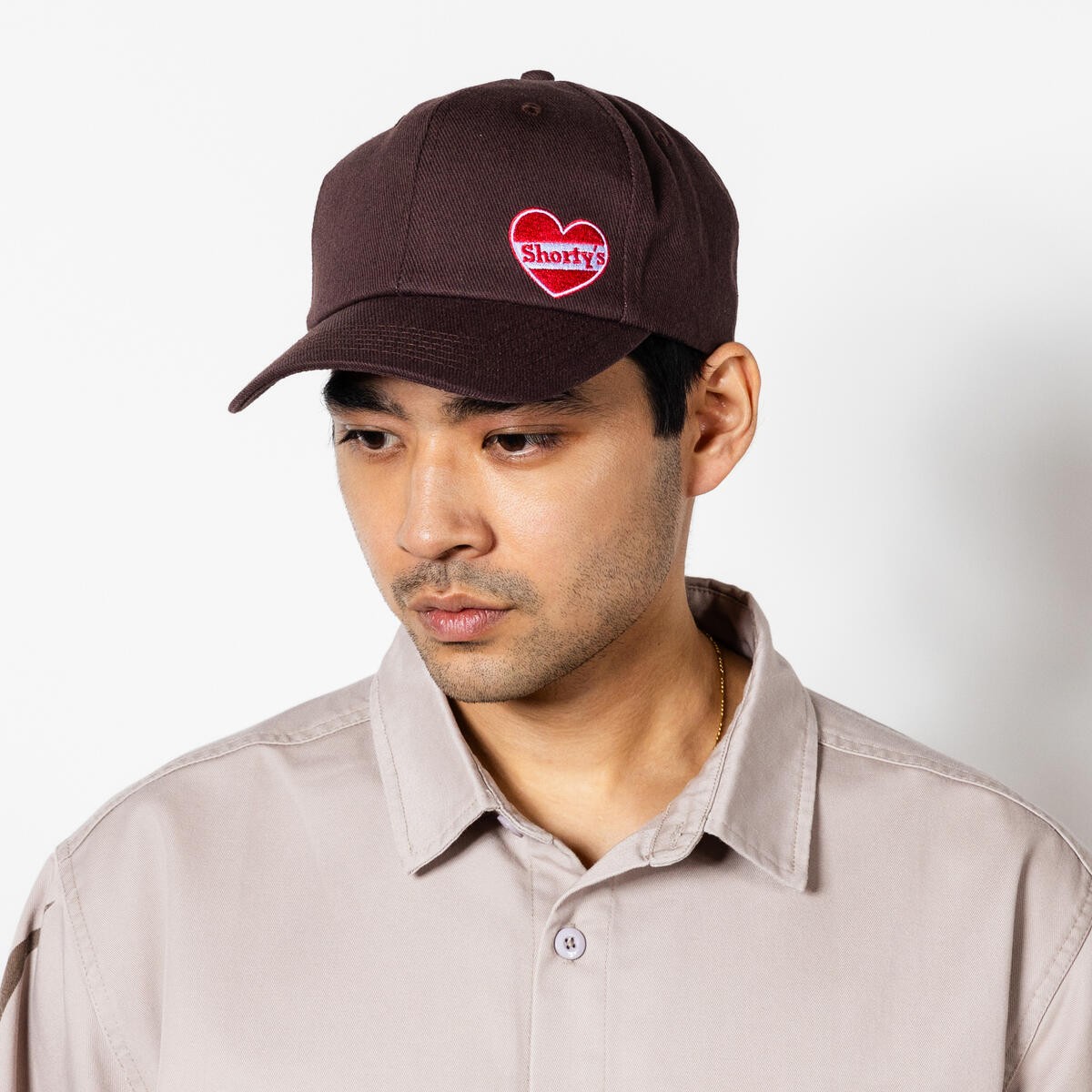 PLEASURES/ץ쥸㡼SHORTY'SHEART SNAPBACK å / BROWN