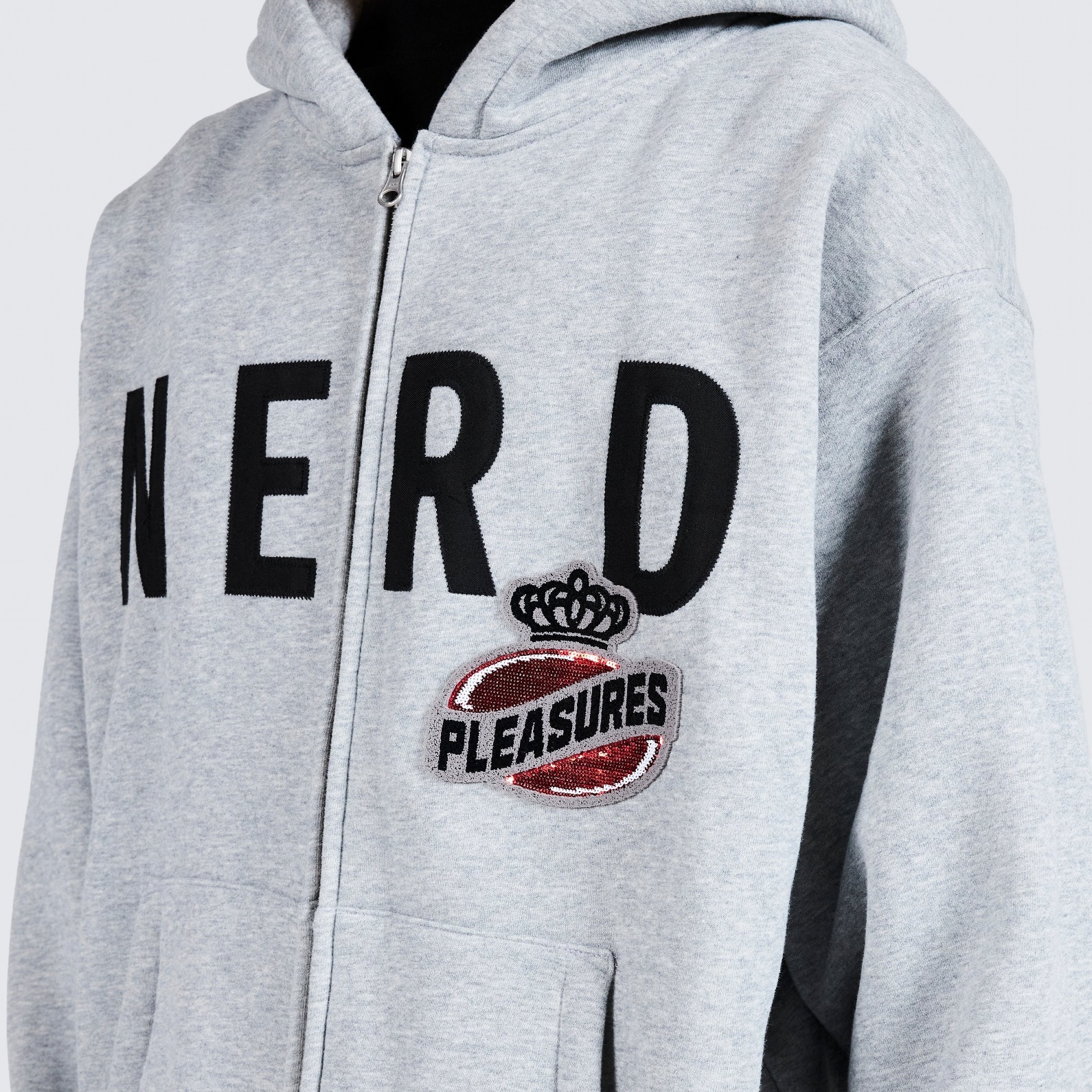 ��PLEASURES/�ץ쥸�㡼����N.E.R.D.��NERD ZIP UP HOODIE �ѡ����� / HEATHER GREY