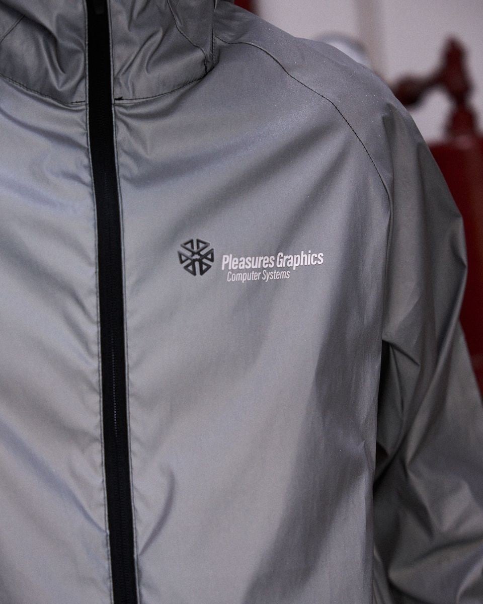 ��PLEASURES/�ץ쥸�㡼����SYSTEM REFLECTIVE JACKET ������ɥ֥졼���� / 3M