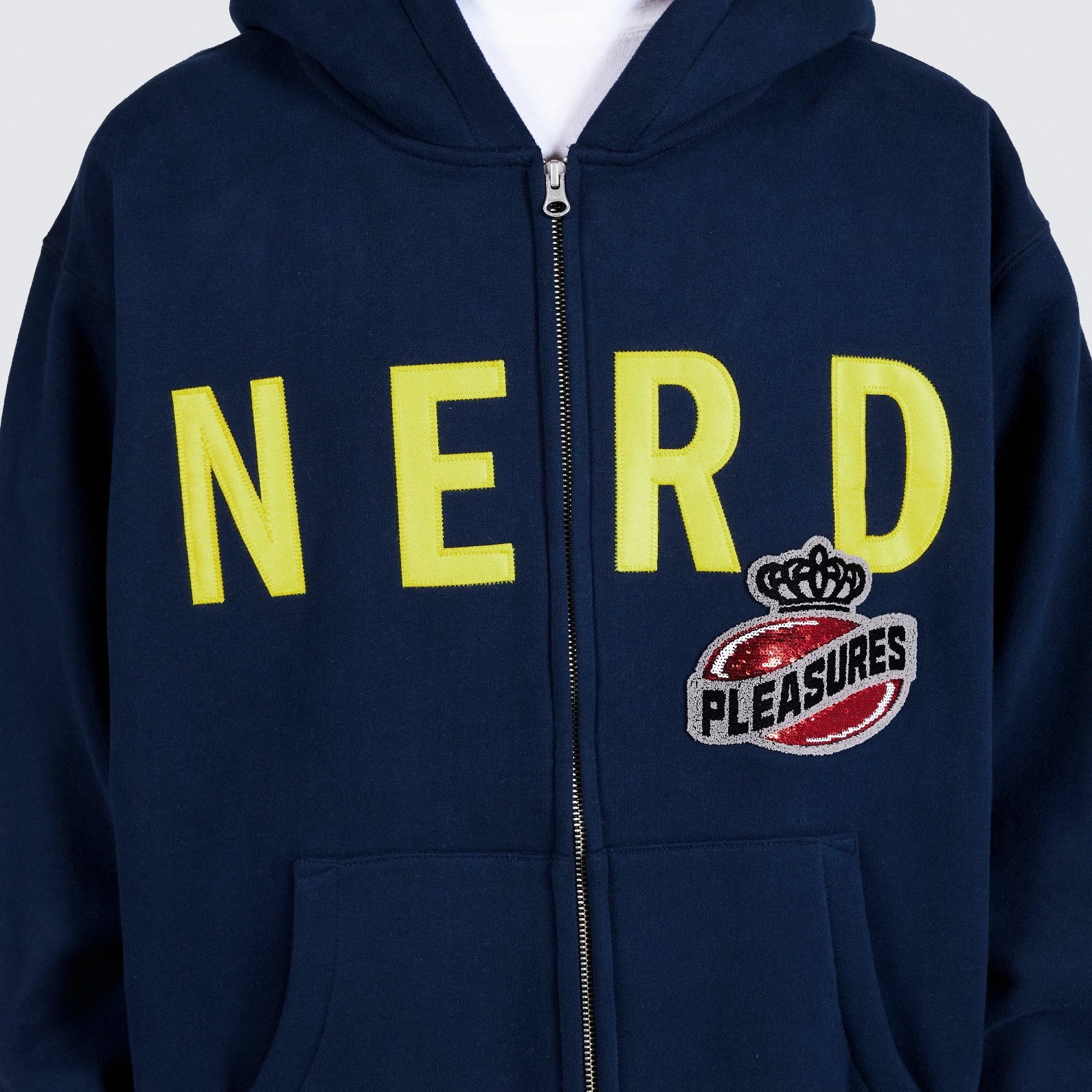 ��PLEASURES/�ץ쥸�㡼����N.E.R.D.��NERD ZIP UP HOODIE �ѡ����� / NAVY