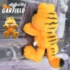 ガーフィールド ぬいぐるみ キャラクター GARFIELD 吸盤 オレンジ マスコット かわいい インテリア プレゼント 置物 人形 猫 ネコ インテリア ディスプレイ ガレージ ダッシュボード 窓 