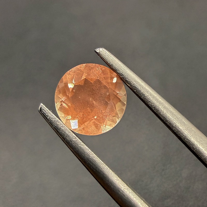 10009554：オレゴンサンストーン RD 6.2mm 0.79ct