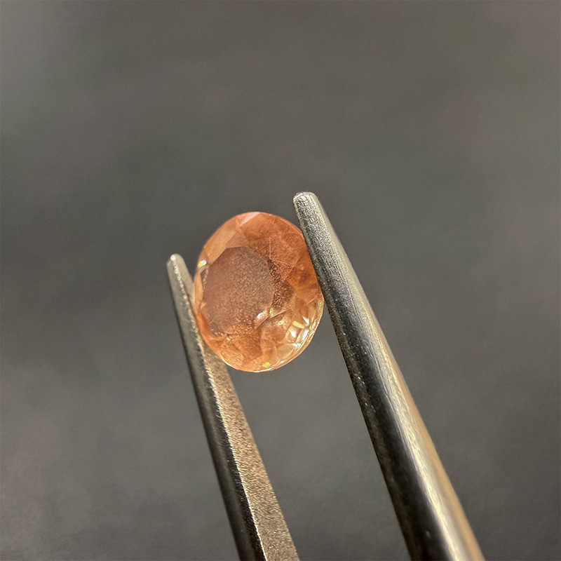10009554：オレゴンサンストーン RD 6.2mm 0.79ct