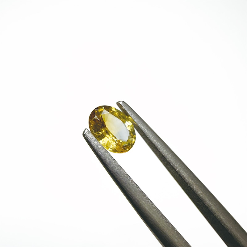 10006313：バイカラー風サファイア OV 5.7×4.3mm 0.51ct