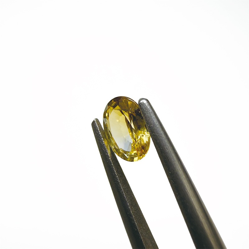 10006313：バイカラー風サファイア OV 5.7×4.3mm 0.51ct