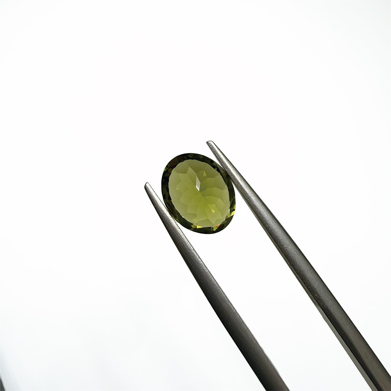 10009018：ペリドット OV 9.9×7.9mm 2.61ct