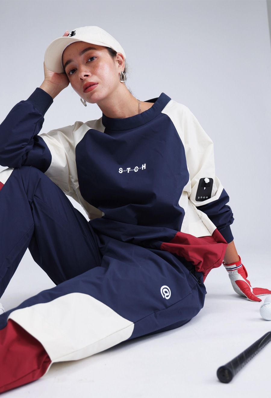 予約：10月上旬納期】ANTIQUA GOLF×STCH 配色パンツ レディース