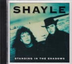 SHAYLE / STANDING IN THE SHADOWS