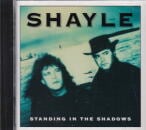SHAYLE / STANDING IN THE SHADOWS