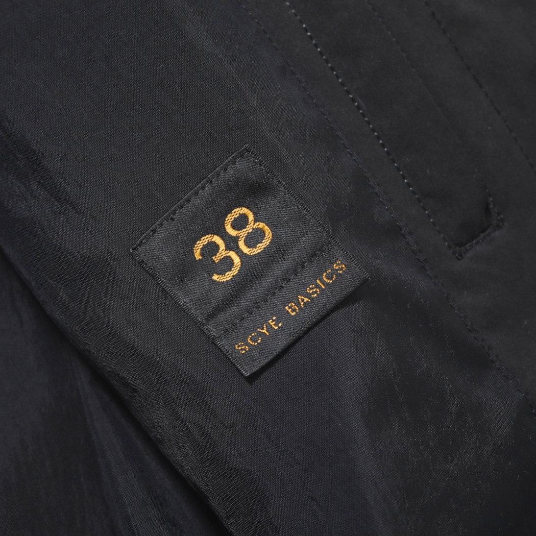 【10%OFF クーポン発行中!!】い。<br><br>SCYE BASICS サイベーシックス High Density Mill Cloth Balmacaan Coat ハイデンシティ ミルクロス バルマカーンコート ブラック