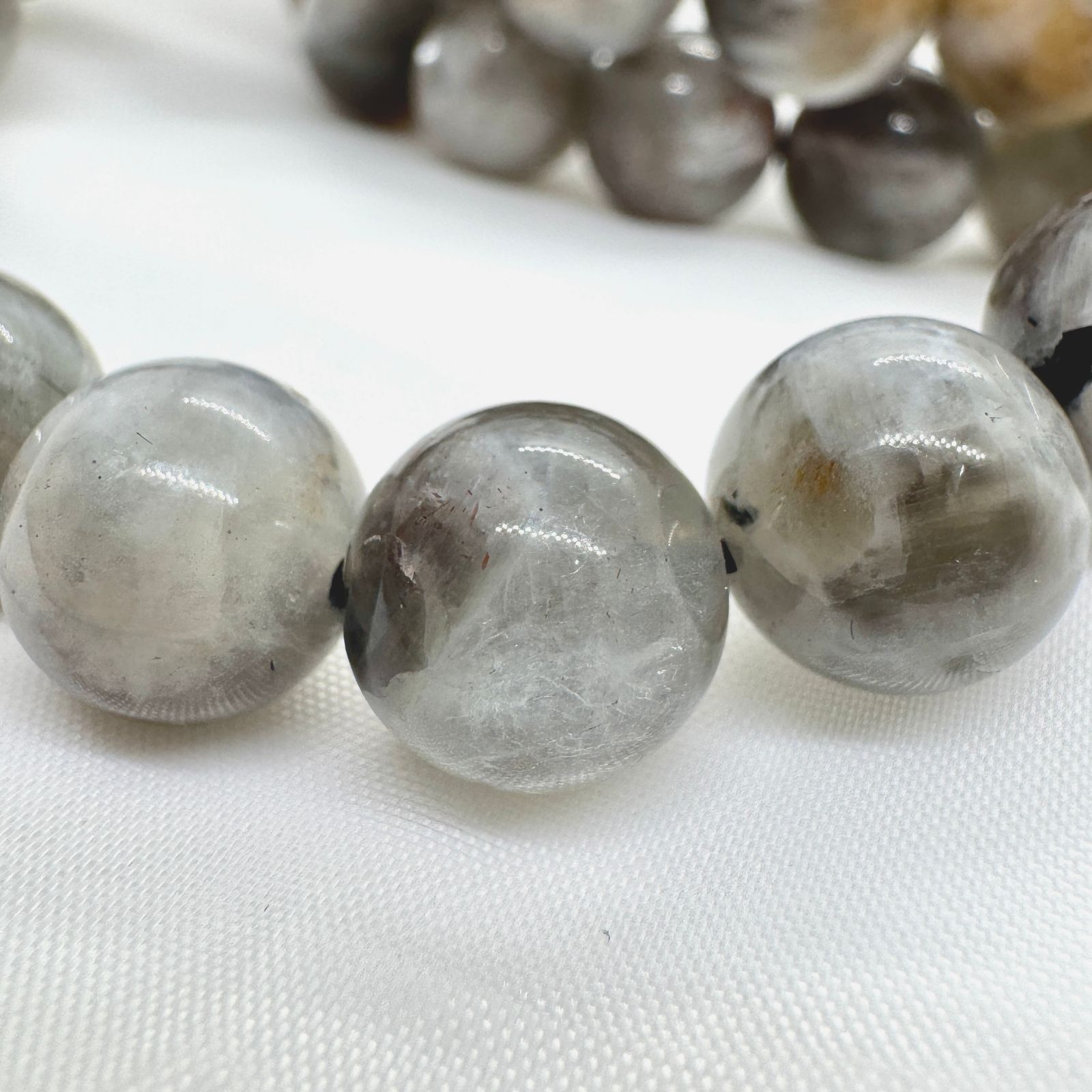 プラチナサンムーンストーン 11mm ブレスレット｜Arancia Stone
