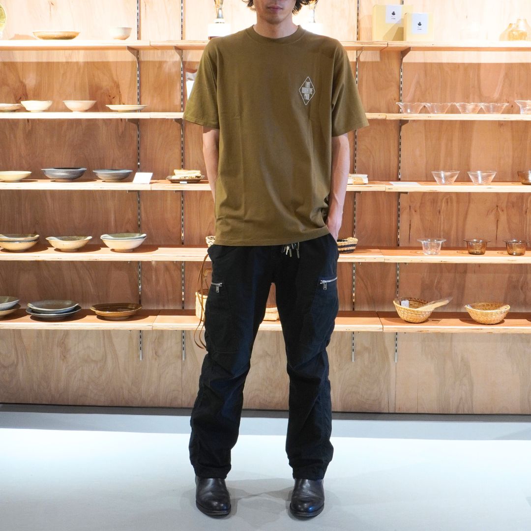 DWELLER S/S TEE “THAT NONNATIVE PROD.”