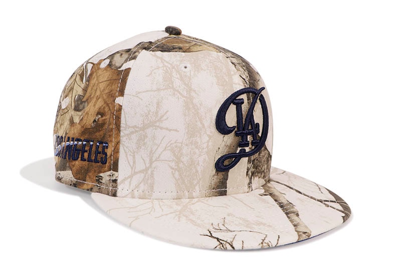 NEW ERA LOS ANGELES DODGERS CITY CONNECT 59FIFTY FITTED CAP (LOS ANGELES SIDE PATCH/ROYAL UNDER VISOR/REALTREE SNOW CAMO)