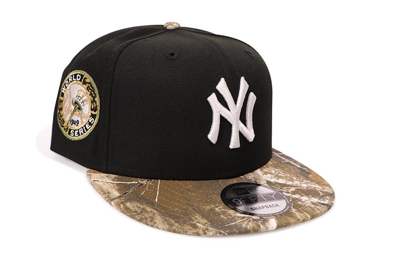NEW ERA NEW YORK YANKEES 9FIFTY SNAPBACK CAP (1949 WORLD SERIES SIDE PATCH/GREY UNDER VISOR/BLACK REALTREE CAMO)