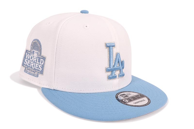 NEW ERA LOS ANGELES DODGERS 9FIFTY SNAPBACK CAP (2024 WORLD SERIES SIDE PATCH/GREY UNDER VISOR/WHITE SKY)