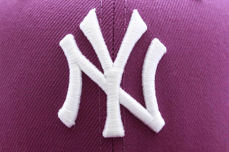 NEW ERA NEW YORK YANKEES 59FIFTY FITTED CAP (1999 WORLD SERIES CUSTOM SIDE PATCH/SKY BLUE UNDER VISOR/SPARKLING PURPLE)