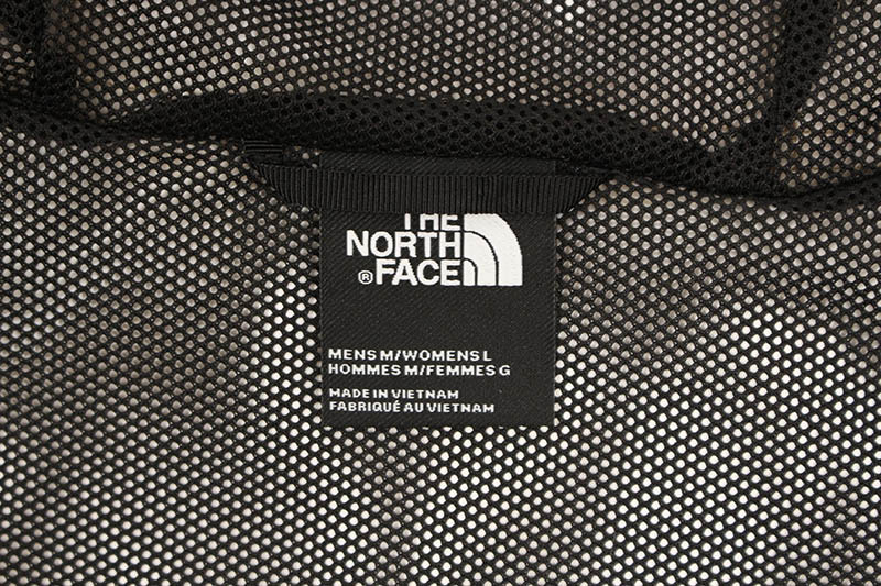 THE NORTH FACE NOVELTY RAIN SHELL JACKET (NF0A52ZX/047:KELP TAN FOREST FLOOR PRINT)