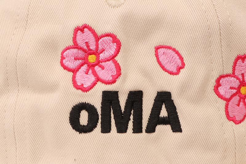 oMA STUDIOS NY KANJI CHERRY BLOSSOM HAT (CREAM)