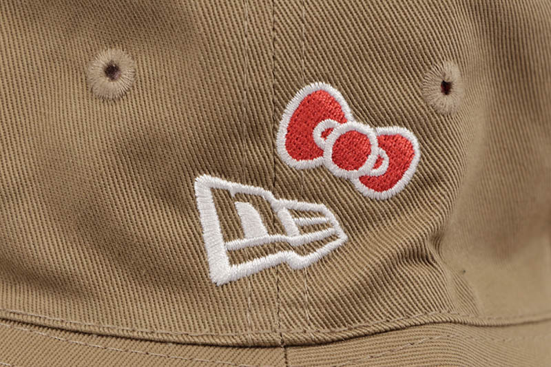 NEW ERA KID'S HELLO KITTY REVERSIBLE BUCKET HAT (KHAKI) 14348590