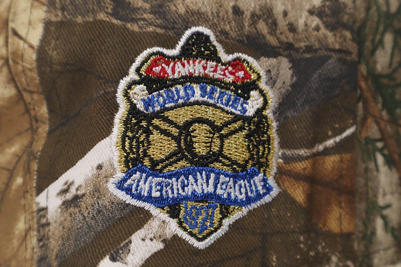 NEW ERA NEW YORK YANKEES 59FIFTY FITTED CAP (1927 WORLD SERIES SIDE PATCH/GREY UNDER VISOR/REALTREE CAMO) 14730499