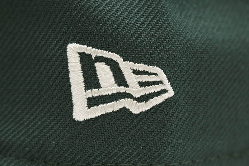 NEW ERA NEW YORK YANKEES 59FIFTY FITTED CAP (1999 WORLD SERIES SIDE PATCH/PINK UNDER VISOR/DARK GREEN)
