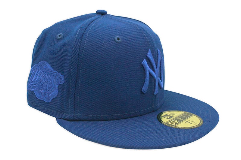 NEW ERA NEW YORK YANKEES 59FIFTY FITTED CAP (1998 WORLD SERIES SIDE PATCH/PINK UNDER VISOR/BLUE TONAL)