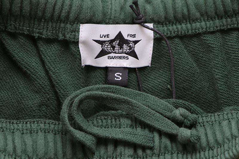 BARRIERS FORT GREEN SWEAT SHORTS