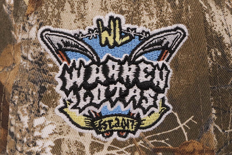 NEW ERA X WARREN LOTAS ATLANTA BRAVES 9FORTY AF M-CROWN ADJUSTABLE CAP (WL LOGO SIDE PATCH/GREY UNDER VISOR/REALTREE CAMO)