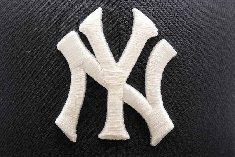 NEW ERA NEW YORK YANKEES 59FIFTY FITTED CAP (1976 WORLD SERIES SIDE PATCH/PINK UNDER VISOR/NAVY)