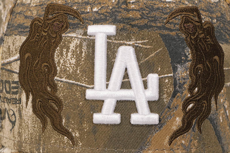 NEW ERA X WARREN LOTAS LOS ANGELES DODGERS 9FORTY AF M-CROWN ADJUSTABLE CAP (WL LOGO SIDE PATCH/GREY UNDER VISOR/REALTREE CAMO)
