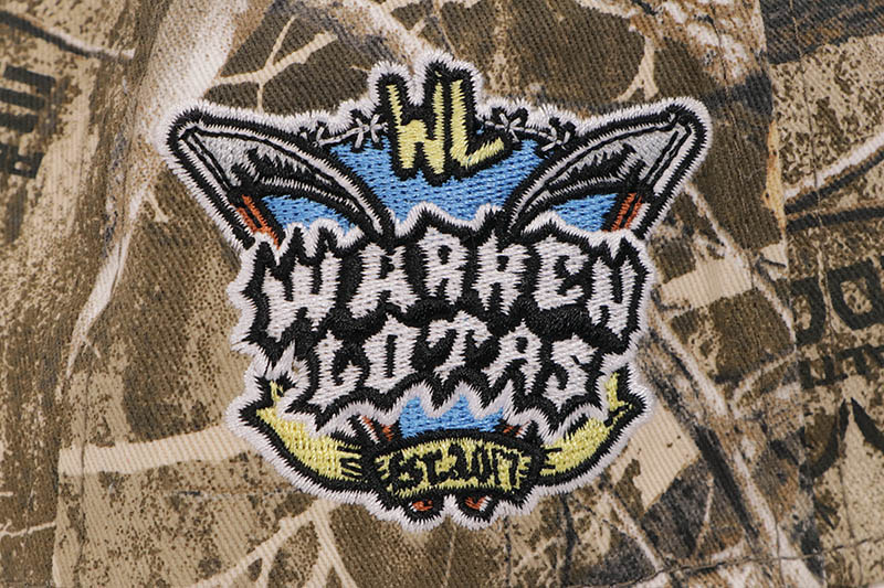 NEW ERA X WARREN LOTAS LOS ANGELES DODGERS 9FORTY AF M-CROWN ADJUSTABLE CAP (WL LOGO SIDE PATCH/GREY UNDER VISOR/REALTREE CAMO)