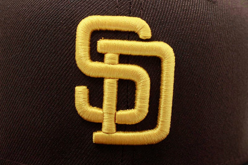 NEW ERA SAN DIEGO PADRES 59FIFTY FITTED CAP (1998 WORLD SERIES SIDE PATCH/PINK UNDER VISOR/BROWN)