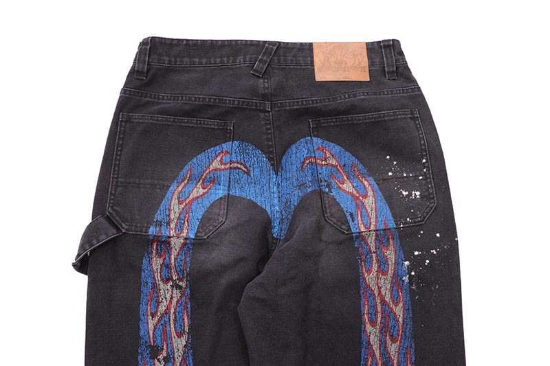 EVISU HEAVY WASHED AND DISTRESSED DAICOCK JEANS (2ESEJM6PT6006RXCT:BLACK)