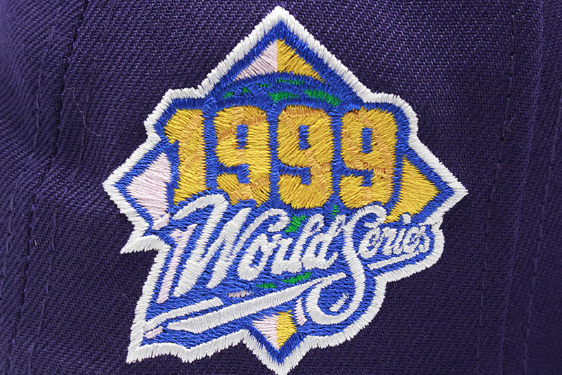 NEW ERA NEW YORK YANKEES 59FIFTY FITTED CAP (1999 WORLD SERIES CUSTOM SIDE PATCH/PINK UNDER VISOR/PURPLE)