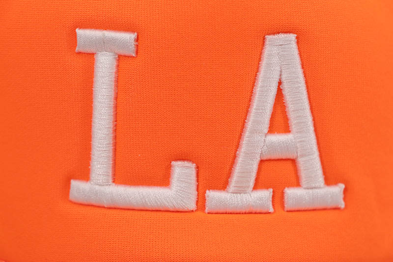 oMA STUDIOS LA TRUCKER HAT (ORANGE CAMO)
