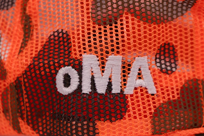 oMA STUDIOS LA TRUCKER HAT (ORANGE CAMO)
