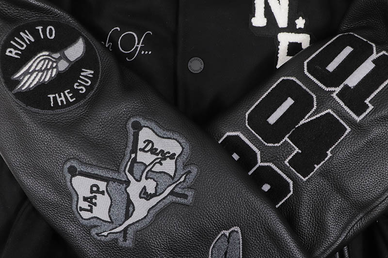 PLEASURES NERD VARSITY JACKET (BLACK)