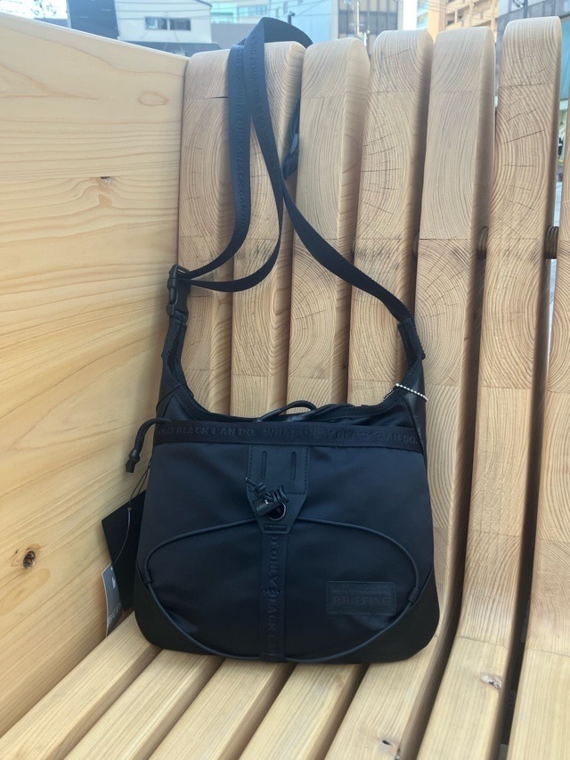 WhiteMountaineering　WM×BRIEFING　エヴリデイサコシュ　　BLACK　BK2671803　　ホワイトマウンテニアリング